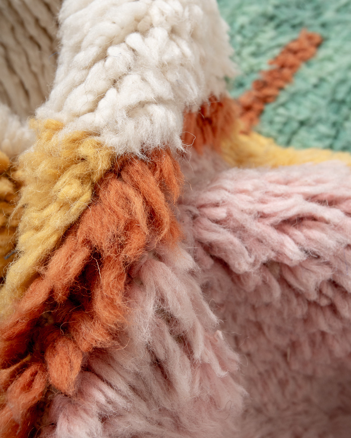 Modern, designer, handcrafted Berber rug from Morocco. Beniourain carpet with beautiful colours and patterns and fluffy wool texture.